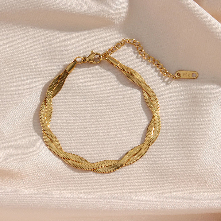 Madioreru | 18K Yellow Gold Twisted Design Bracelet